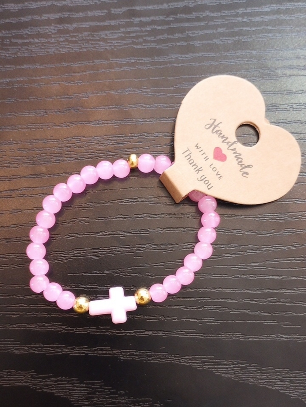 Handmade Pink Glass Beaded Bracelet with Cross Accent